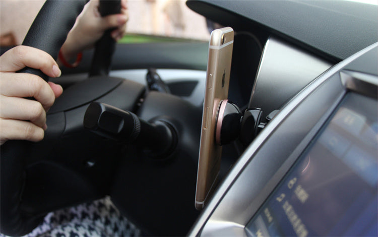 Flag Village Auto Tools Car mobile phone navigation bracket mobile phone rack outlet magnetic car 360 degree magnetic rotating magnet bracket